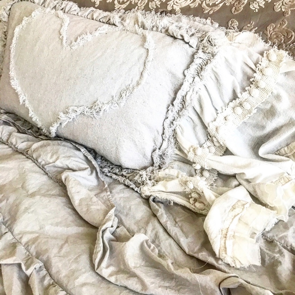 Luxurious Cream Layered Heart Pillow with Fringe Detailing